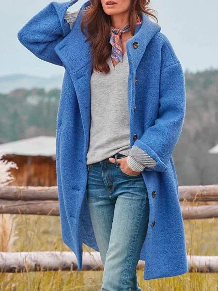 Warm long coat with button closure and hood