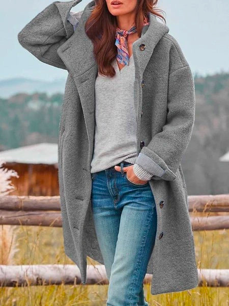 Warm long coat with button closure and hood