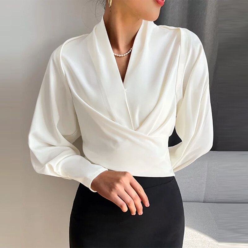 Elegant Omslagsbluse med Lange Ballonærmer og V-hals