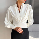 Elegant Omslagsbluse med Lange Ballonærmer og V-hals