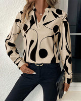 Elegant Bluse med Stående Krave og Print
