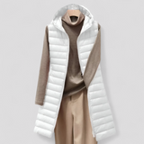 Lang vatteret damevest – stilfuldt ærmeløst vinterdesign