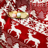 Varm juleplaid – blødt vintertæppe med festligt motiv