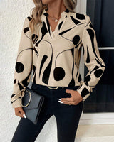 Elegant Bluse med Stående Krave og Print
